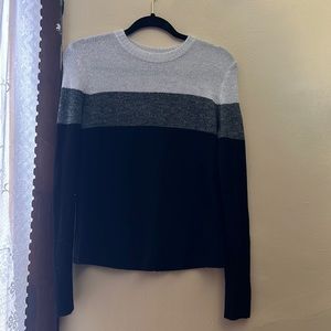 I am selling a neutral colored sweater.